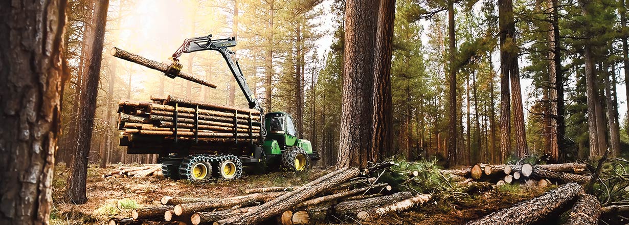 Even before John Deere officially began producing forestry equipment, logge...